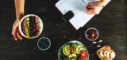 healthy food and notebook flat lay