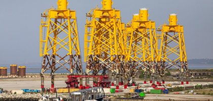 Yellow structures in Cherbourg port, showcasing marine industrial installations in Normandy, France