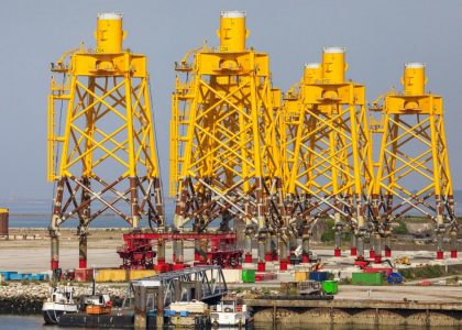 Yellow structures in Cherbourg port, showcasing marine industrial installations in Normandy, France